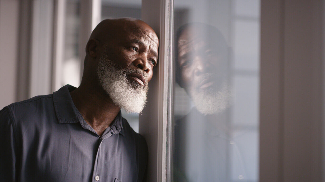 older man suffering from depression 