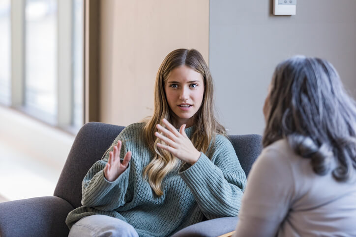 two women having a conversation about mental disorders