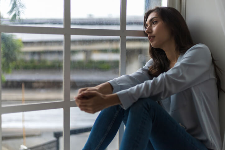 a young woman suffering from mood disorders